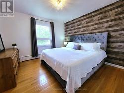 Primary Bedroom Window Overlooks Fully Fenced Yard -