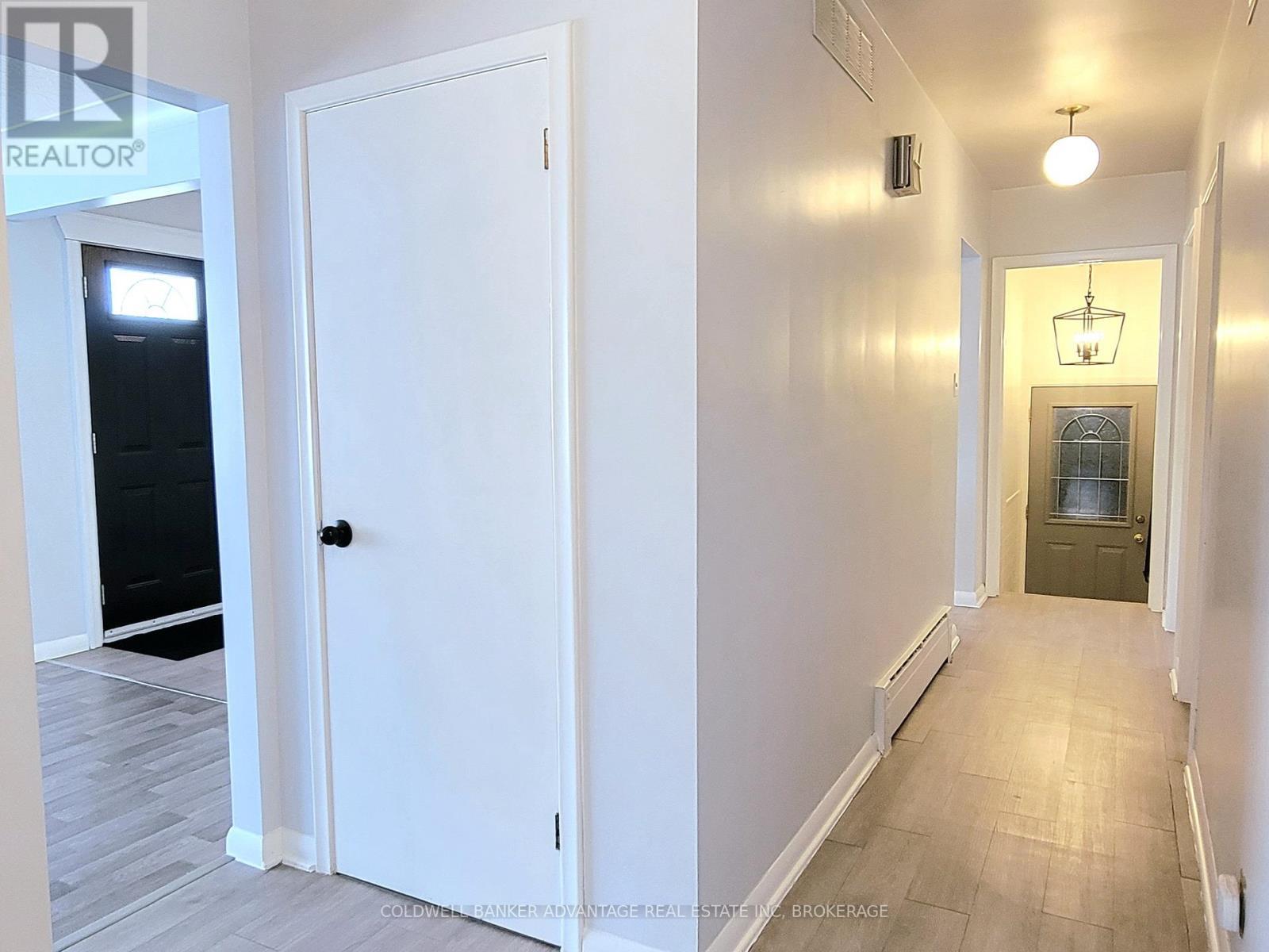 Main Floor Hallway Leads To Closed In Breezeway - 280 Clarke Street, Port Colborne (Killaly East), ON - Indoor Photo Showing Other Room