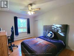 Main Floor Secondary Bedroom Backyard Window View -