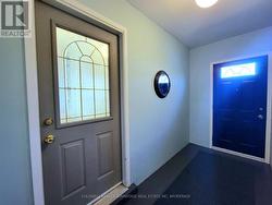 Closed In Breezeway Leads To Driveway and Home -