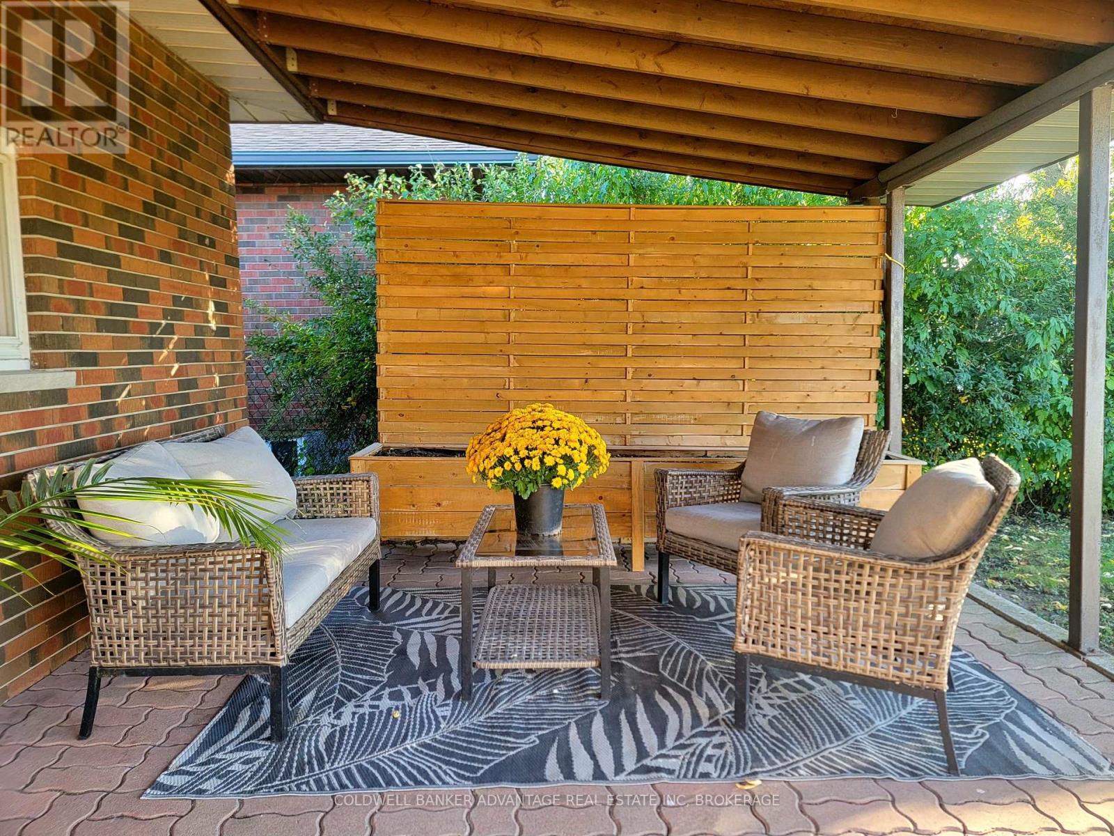 Backyard Covered Patio Access Through Garage - 280 Clarke Street, Port Colborne (Killaly East), ON - Outdoor With Deck Patio Veranda With Exterior