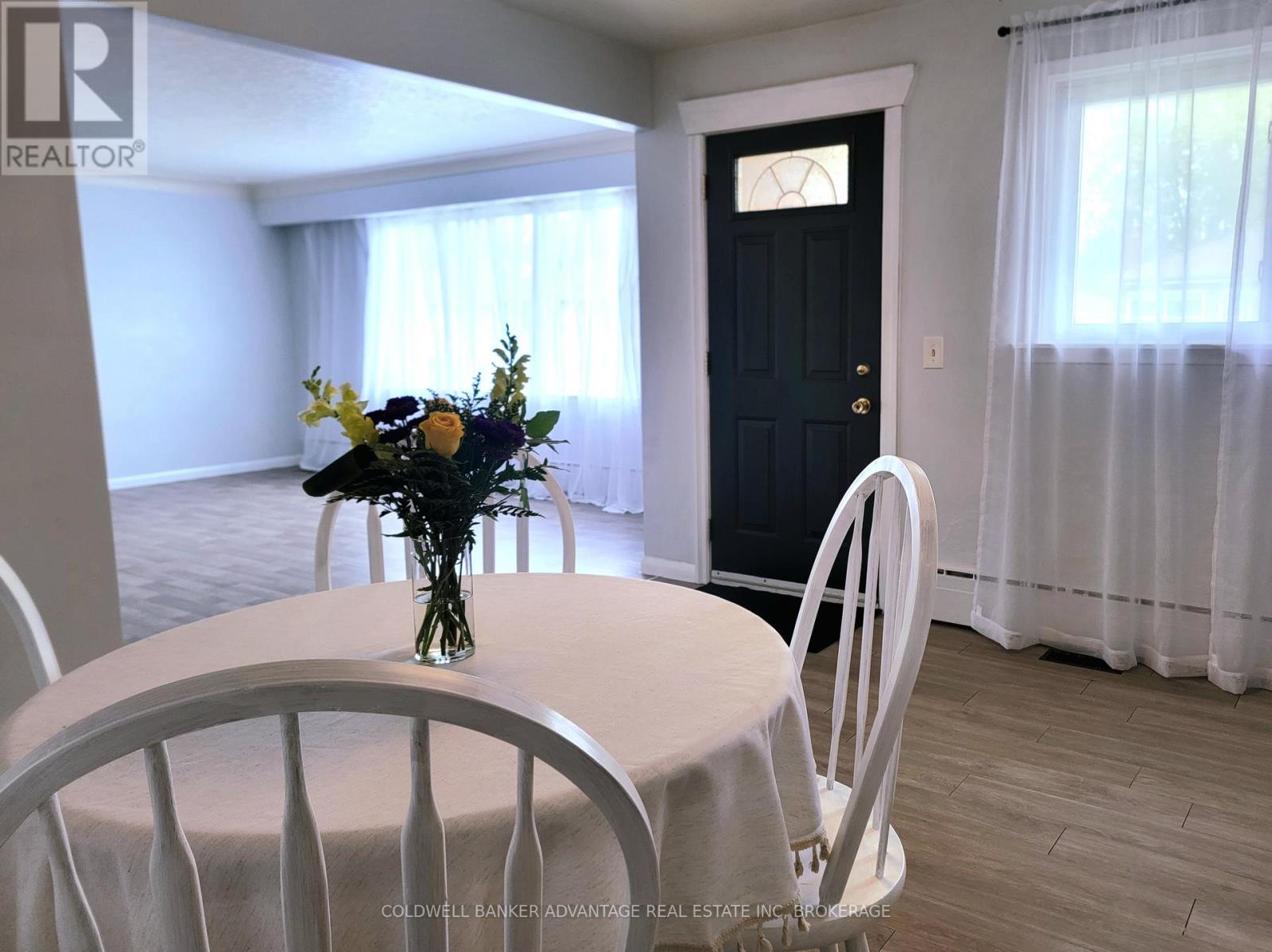 Front Entrance Into Living Room and Eat-In Kitchen - 280 Clarke Street, Port Colborne (Killaly East), ON - Indoor Photo Showing Dining Room