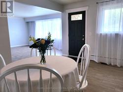 Front Entrance Into Living Room and Eat-In Kitchen -