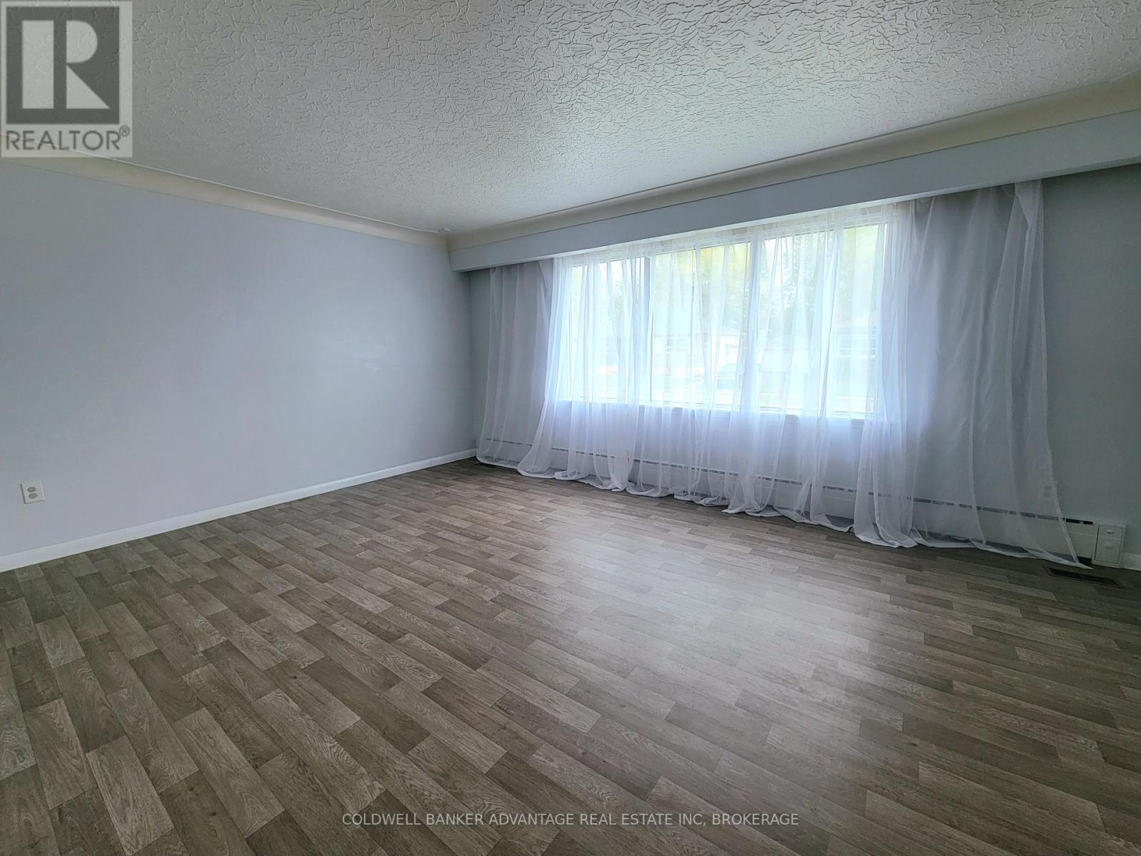 Living Room Large Window Allows In Natural Light - 280 Clarke Street, Port Colborne (Killaly East), ON - Indoor Photo Showing Other Room