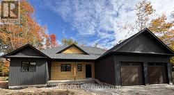 Front of home; staining still reqd -