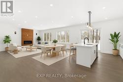 Virtually staged dining/living room -
