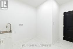 Laundry / mud room combo w/o to garage -