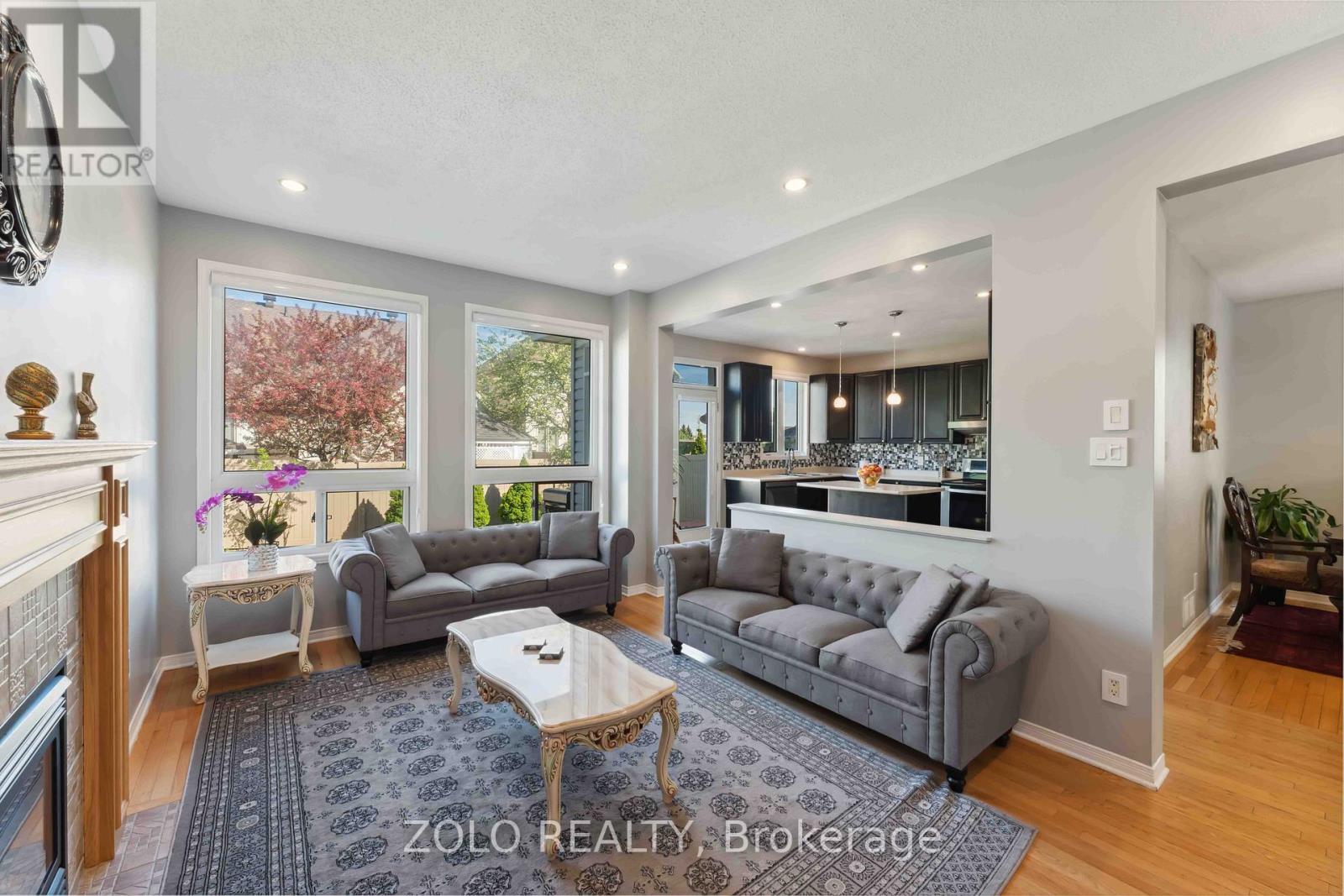 2421 Glandriel Crescent, Ottawa, ON - Indoor Photo Showing Living Room With Fireplace
