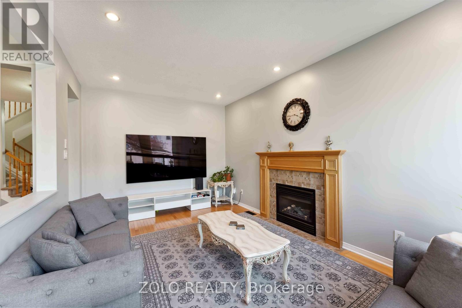 2421 Glandriel Crescent, Ottawa, ON - Indoor Photo Showing Living Room With Fireplace
