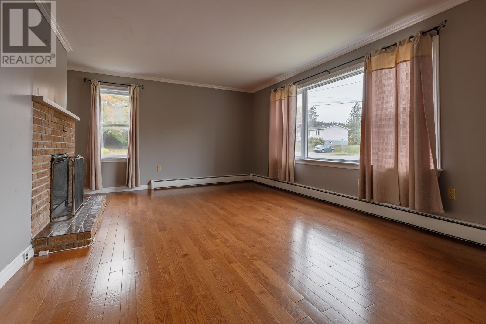 52 Glenhaven Boulevard, Corner Brook, NL - Indoor Photo Showing Other Room With Fireplace