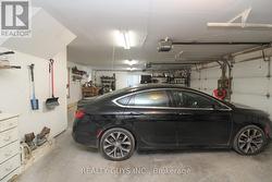 INSIDE OVERSIZED TRIPLE GARAGE -