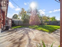 Patio with lawn space for the dogs & kids to play -