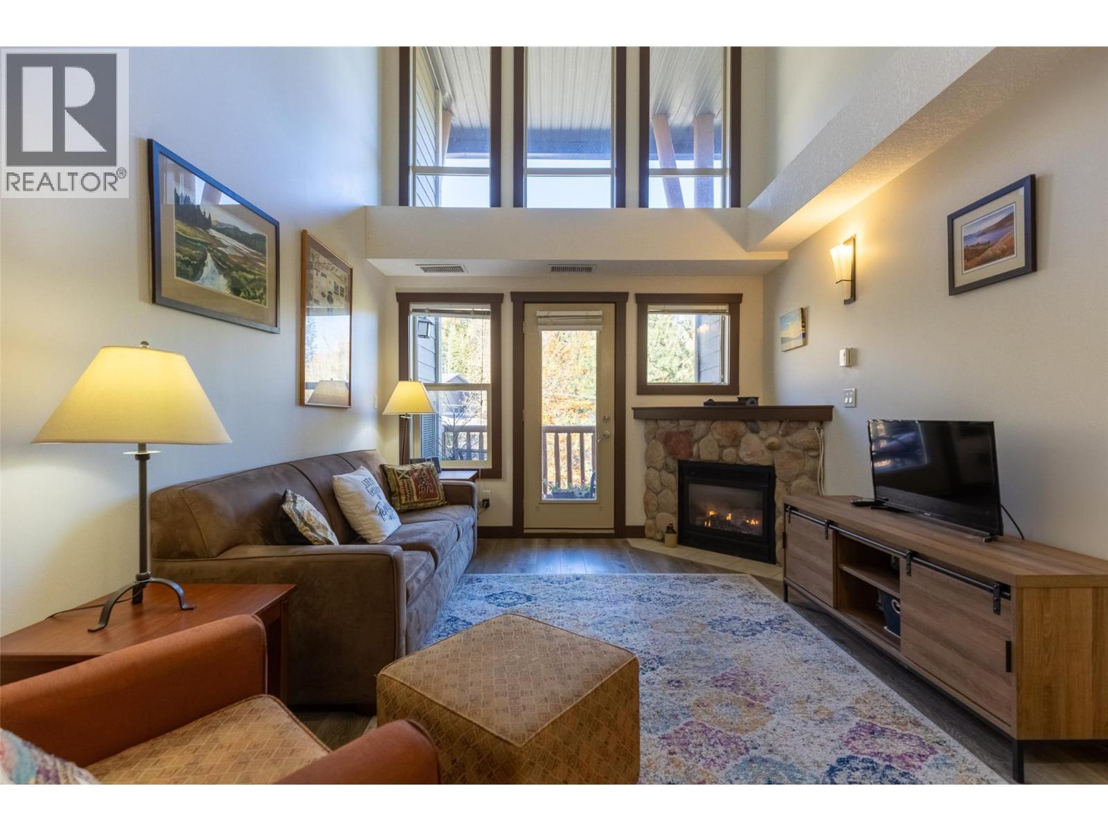 1500 Mcdonald Avenue Unit# 416, Fernie, BC - Indoor Photo Showing Living Room With Fireplace