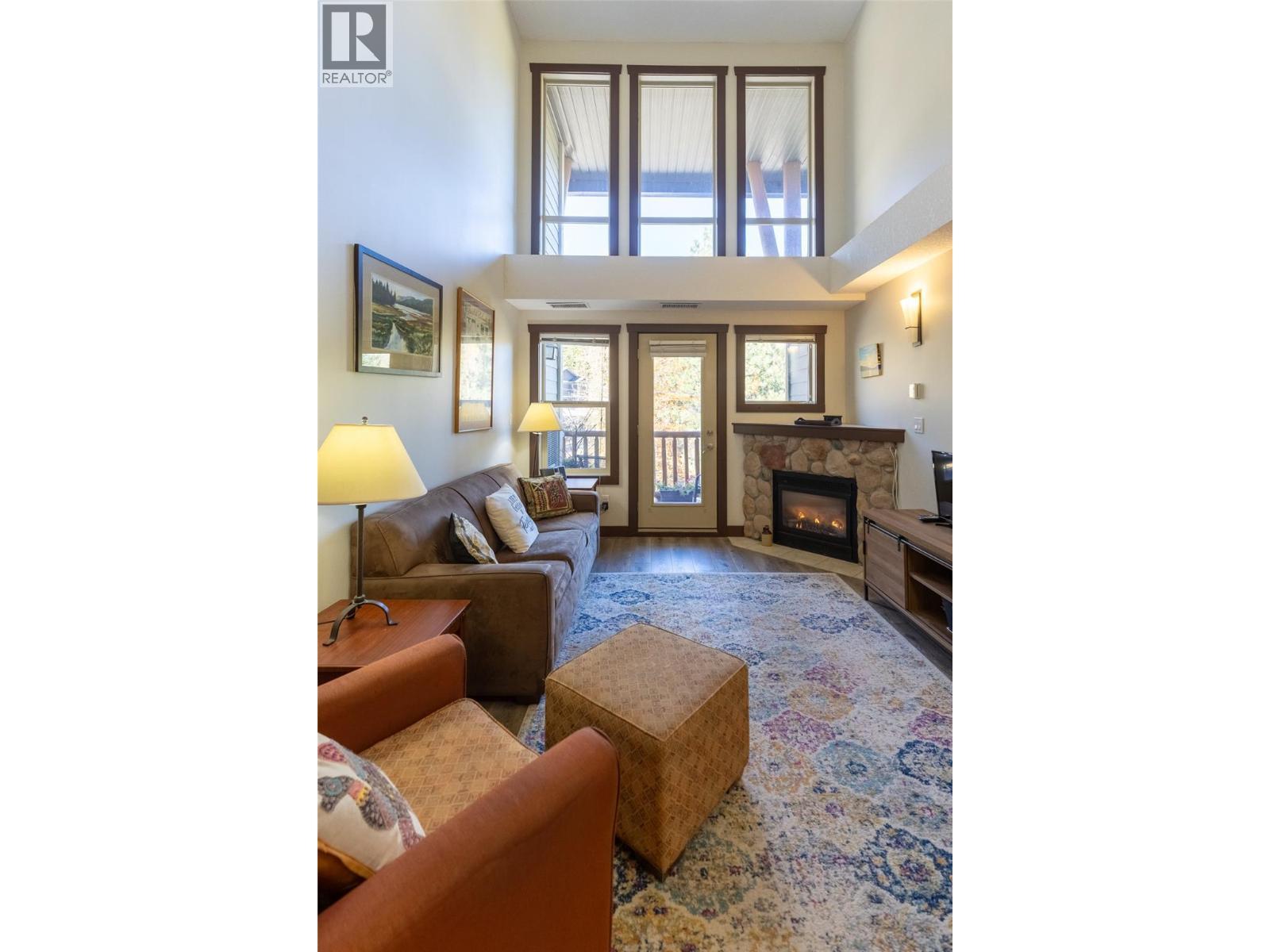 1500 Mcdonald Avenue Unit# 416, Fernie, BC - Indoor Photo Showing Living Room With Fireplace