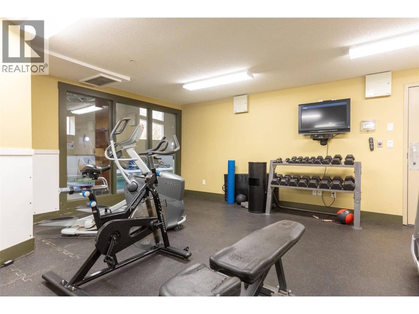 1500 Mcdonald Avenue Unit# 416, Fernie, BC - Indoor Photo Showing Gym Room