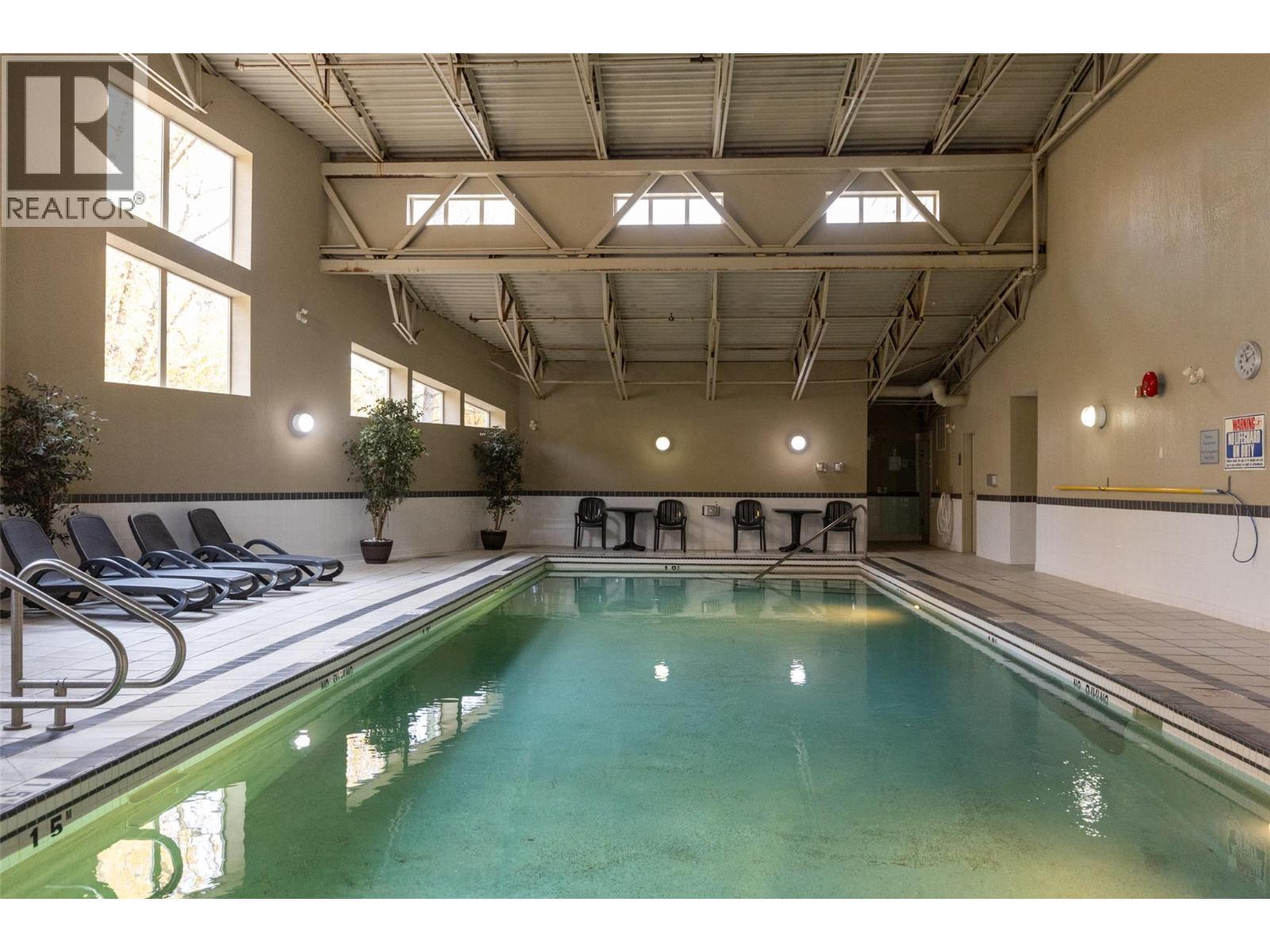 1500 Mcdonald Avenue Unit# 416, Fernie, BC - Indoor Photo Showing Other Room With In Ground Pool