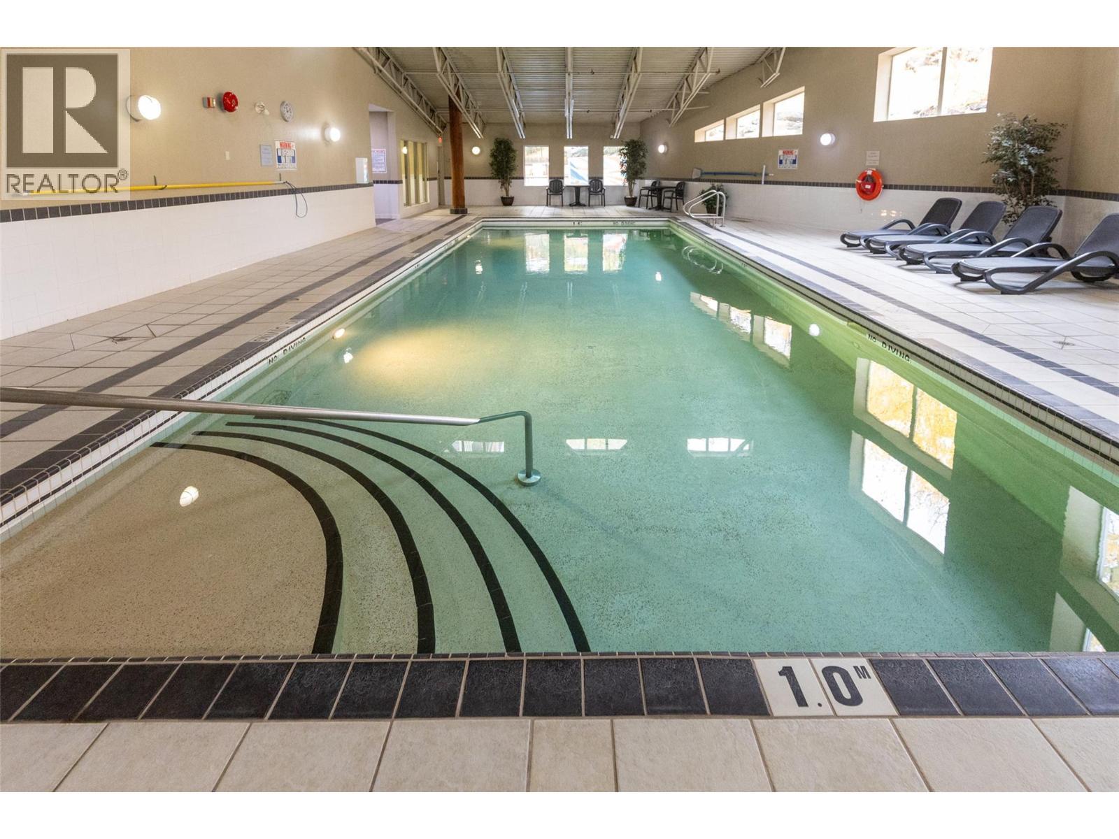 1500 Mcdonald Avenue Unit# 416, Fernie, BC - Indoor Photo Showing Other Room With In Ground Pool