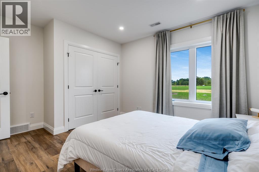 188 County Rd 27 East, Cottam, ON - Indoor Photo Showing Bedroom