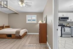 Cozy bedroom situated right off the kitchen -