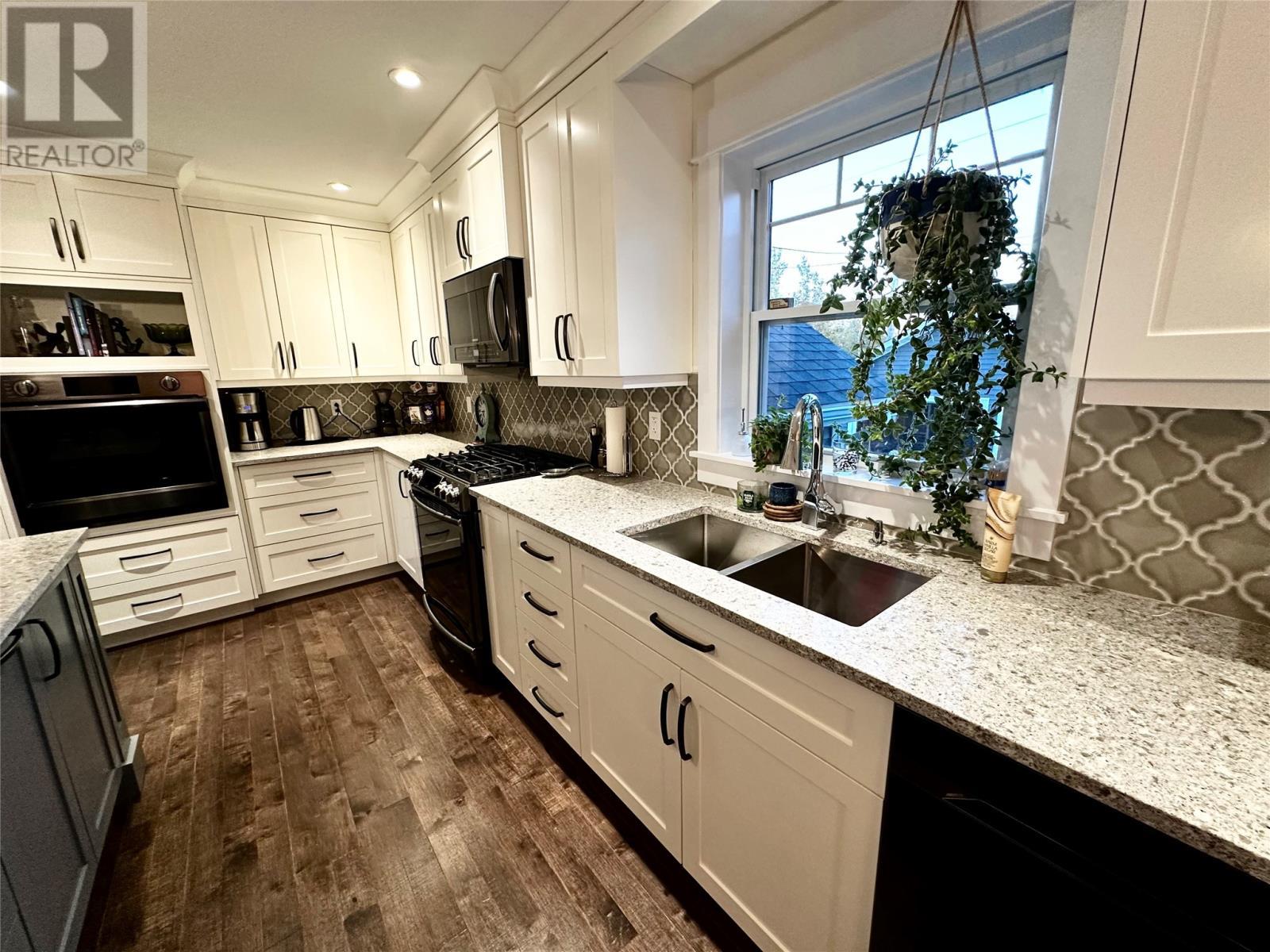 15 Ivany'S Road, Grand Falls-Windsor, NL - Indoor Photo Showing Kitchen With Double Sink