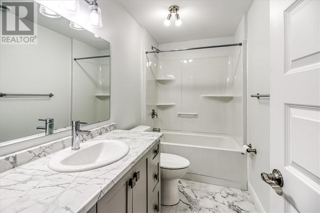 66 Meadowgreen Drive, Garson, ON - Indoor Photo Showing Bathroom