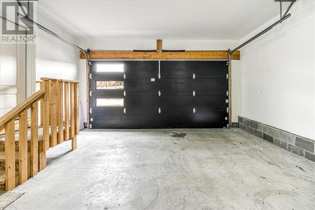 66 Meadowgreen Drive, Garson, ON - Indoor Photo Showing Garage