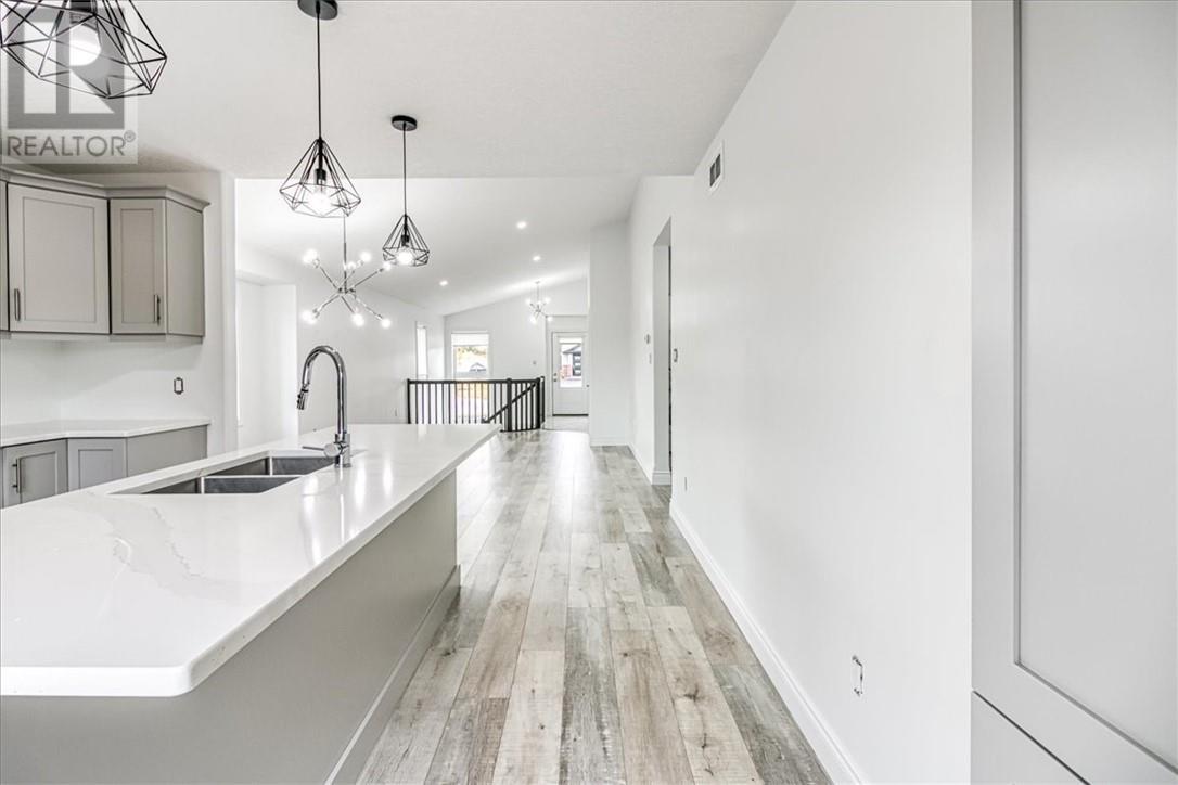 66 Meadowgreen Drive, Garson, ON - Indoor Photo Showing Kitchen With Double Sink