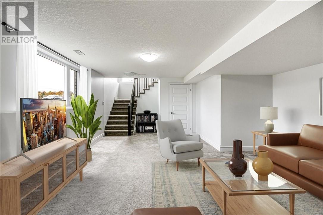 66 Meadowgreen Drive, Garson, ON - Indoor Photo Showing Living Room