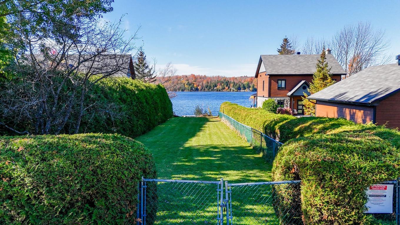 Access to a body of water - 1242 Rue Des Tourterelles, Magog, QC - Outdoor With Body Of Water