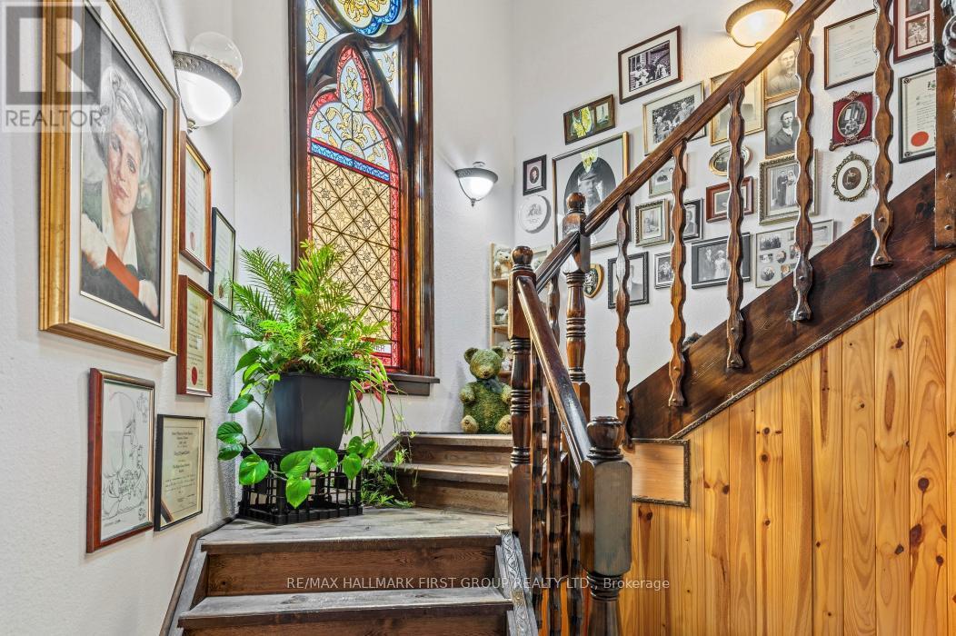 Separate entry to Grand Staircase for upper level - 74 Cottage Lane, Tweed (Elzevir (Twp)), ON - Indoor Photo Showing Other Room