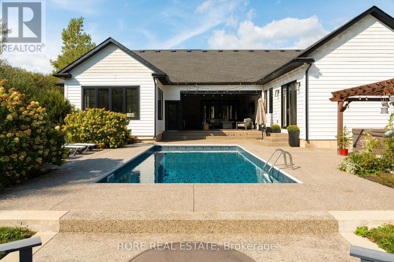 Saltwater Pool, Exposed Aggregate Concrete - 2439 Garrison Road, Fort Erie (Ridgeway), ON - Outdoor With In Ground Pool