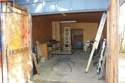 Garage with storage room at the back -