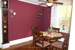 Dining room with kitchen behind it. -