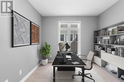 Virtually Staged Main Floor Office -