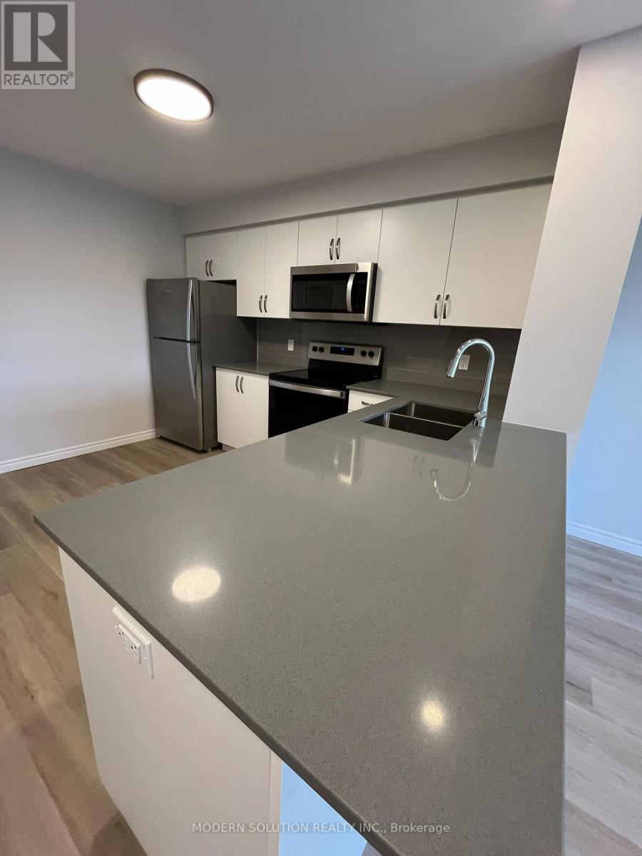412 - 425 Watson Parkway N, Guelph, ON - Indoor Photo Showing Kitchen
