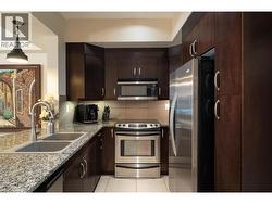 functional kitchen, stainless appliances -