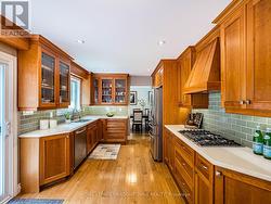 Chef inspired kitchen with solid wood cabinetry -