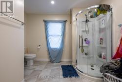 The upper unit's renovated 3pc bathroom. -