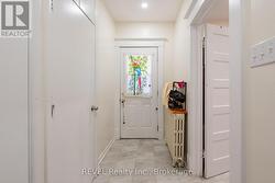 The front entrance to the front main floor unit. -