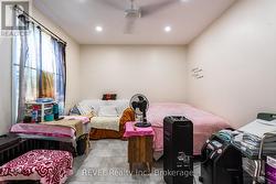 The spacious front bedroom. Could be a living room -