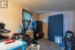 The good size bedroom in the back 1 bedroom unit. -