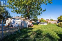 This back section of the yard is fenced. -