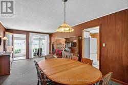 Dining Room Looking To Front Sunroom -