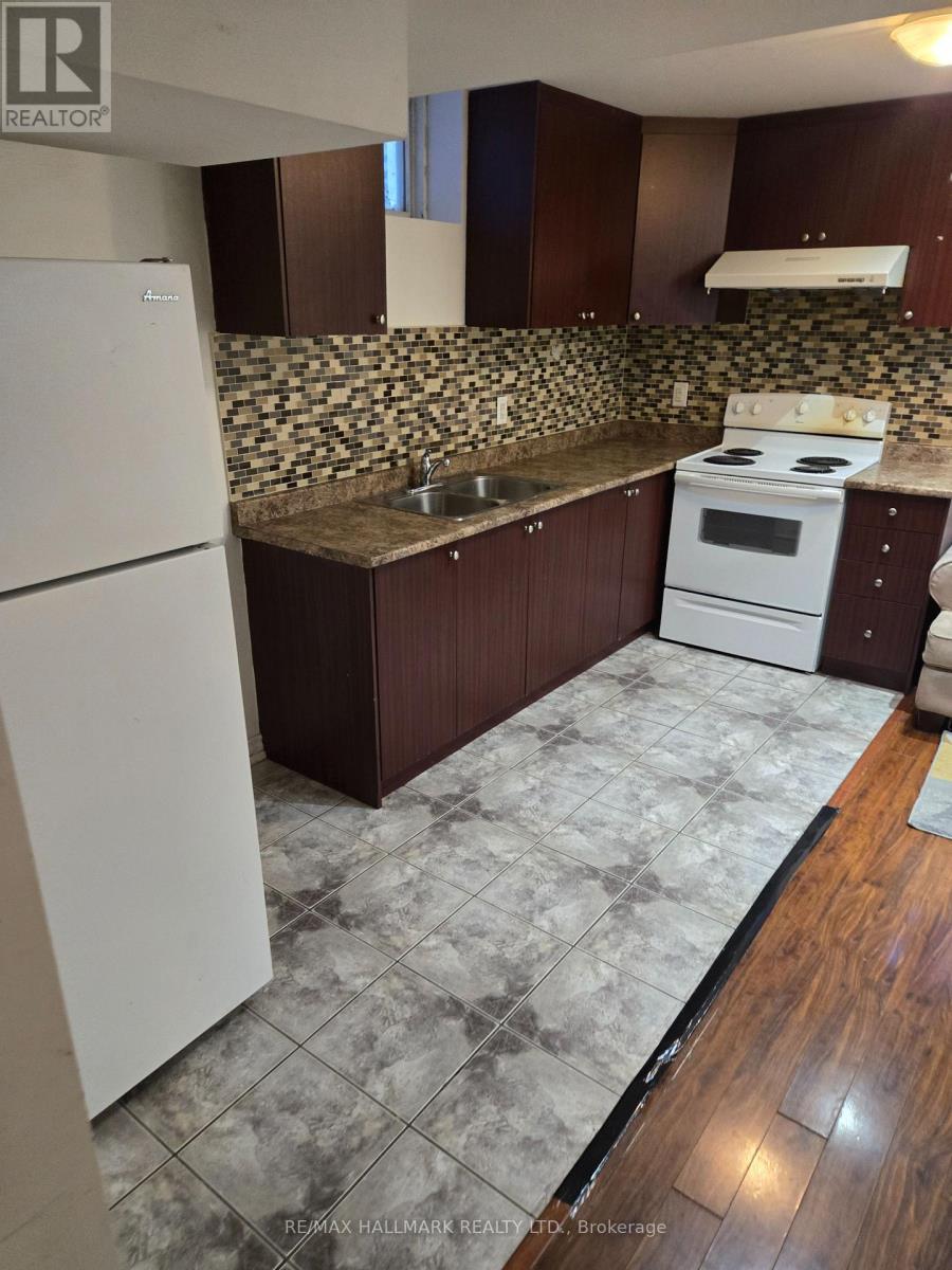 Basement - 48 Bevington Road, Brampton, ON - Indoor Photo Showing Kitchen With Double Sink