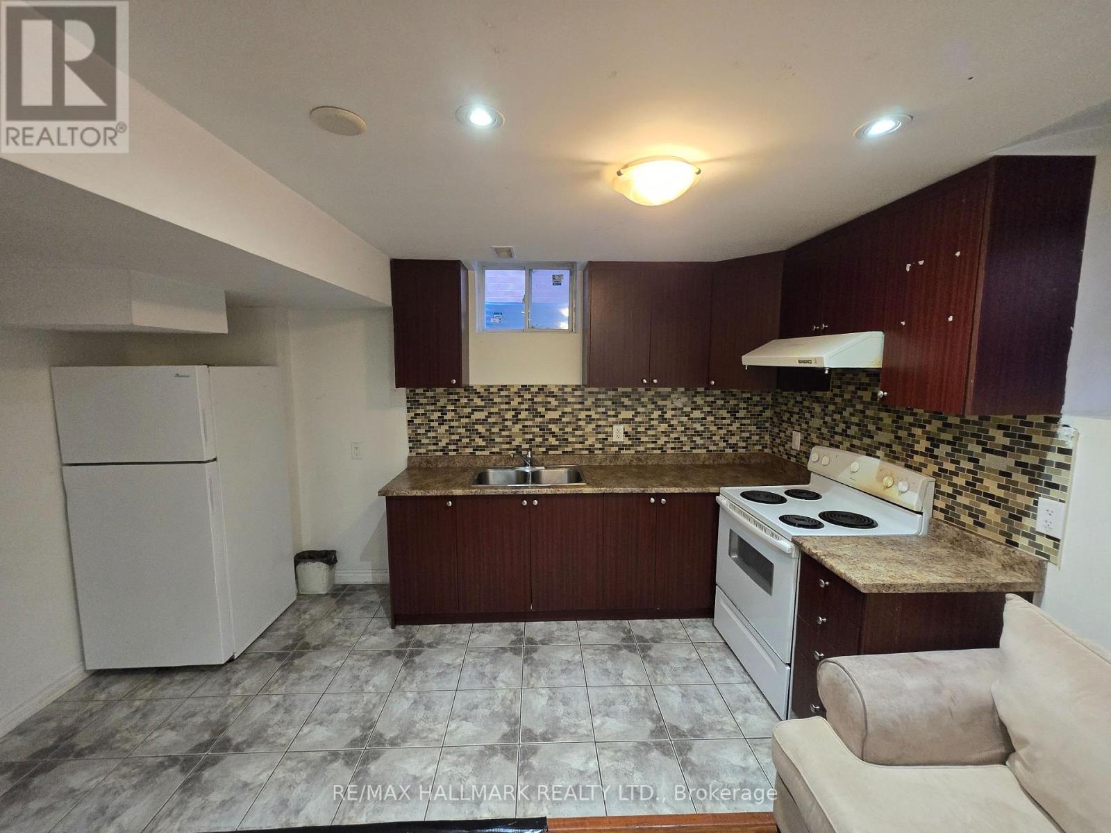 Basement - 48 Bevington Road, Brampton, ON - Indoor Photo Showing Kitchen With Double Sink