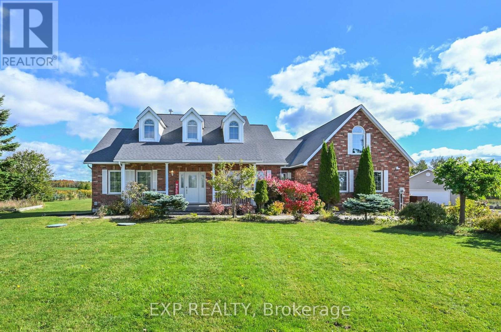 Perennial Gardens through out - 434499 4Th Line, Amaranth, ON - Outdoor With Facade