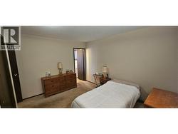 Primary bedroom with the ensuite door visible -