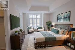 Primary bedroom with virtual furnishings -