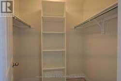 walk-in closet with shelving -