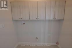 cabinetry in laundry room -
